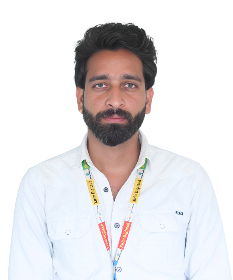 "Anand Meena, graphic designer and CRM executive at Xtrim Digitech Pvt Ltd, Indore, in formal white shirt and company lanyard, handling creative projects and client relationships since 2024"​