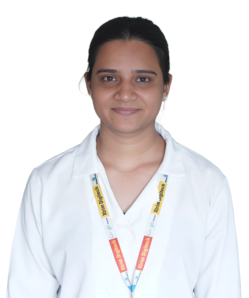 Payal Choudhary, CRM executive at Xtrim Digitech Pvt Ltd, Indore, in formal white outfit and company lanyard, managing client relationships and communications since 2024